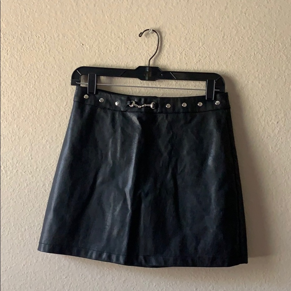 Black leather mini skirt